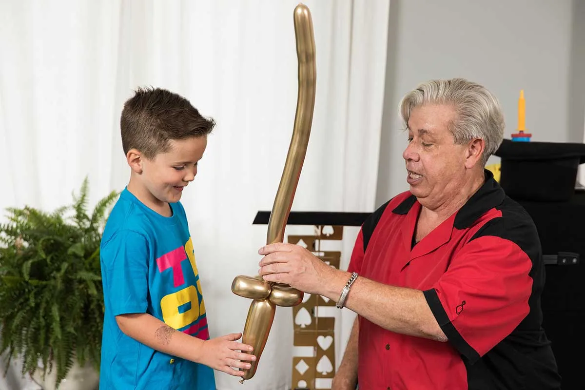 A kids' party crowd reacting to a trick